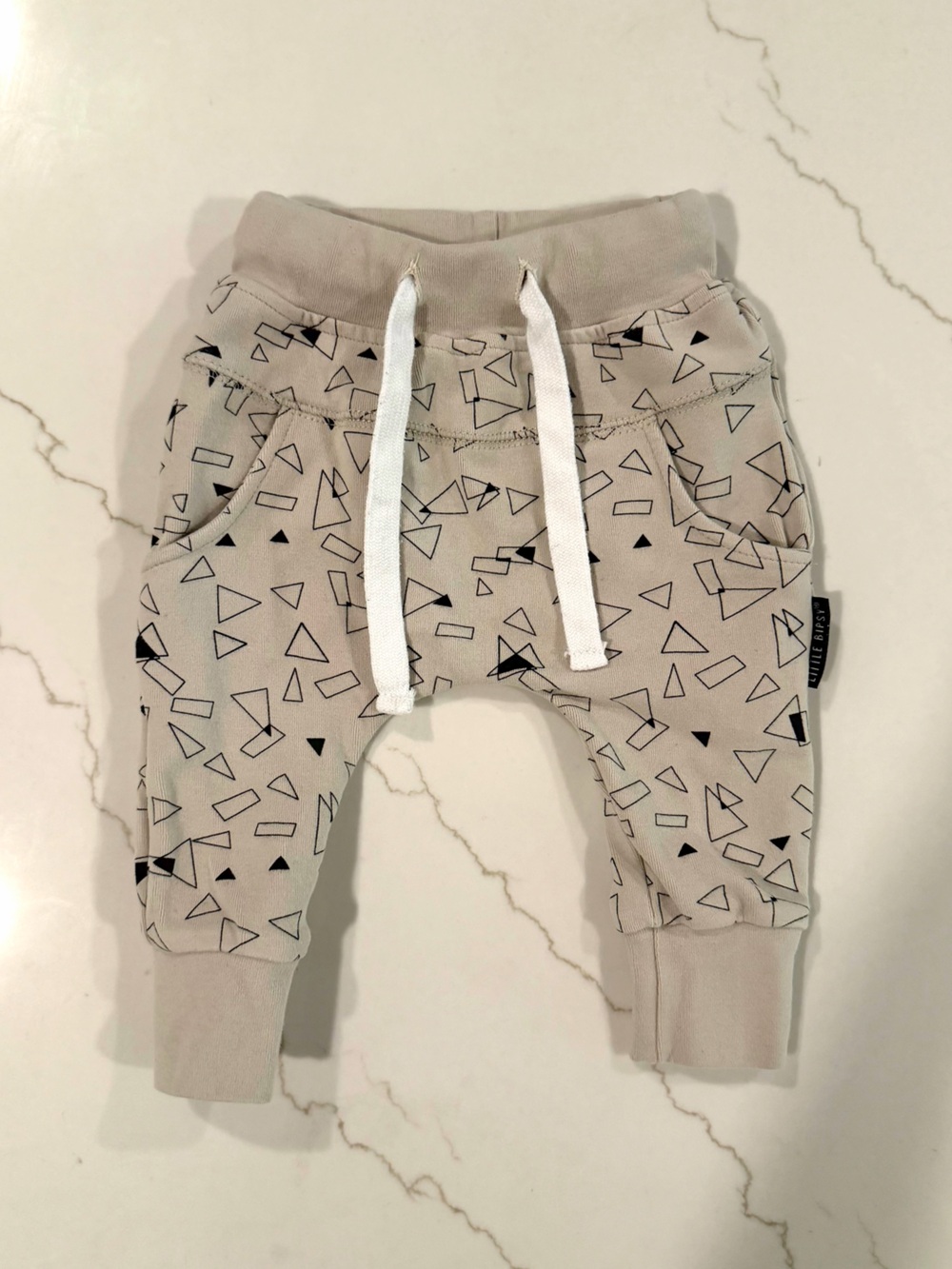 Little Bipsy Beige Jogger Pants with Black Geometric Print